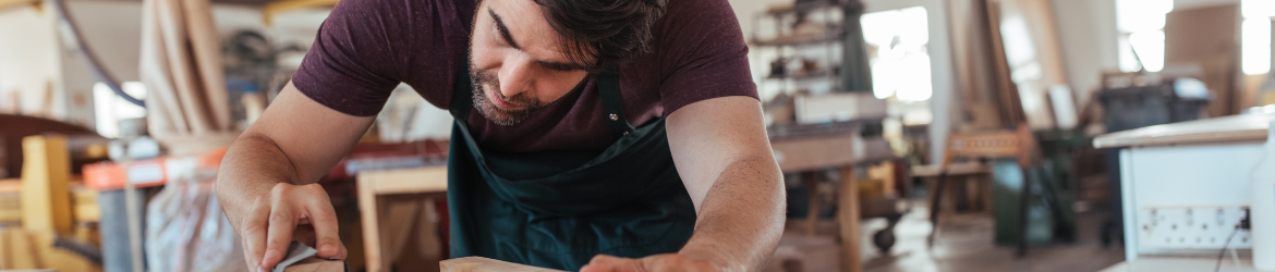 Man working in woodshop.