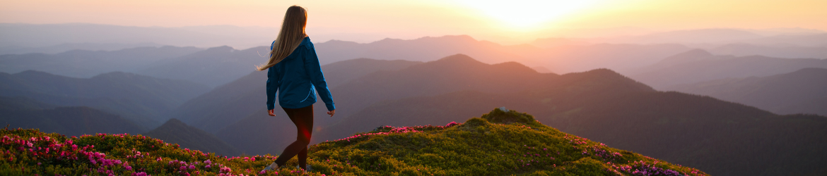 Person walking on top Blue Ridge Mountains.